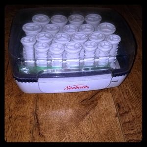 Hot rollers and curling iron with brush as a set